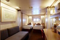 Celestyal Journey   Outside stateroom   Twin bed setup   © Celestyal Cruises