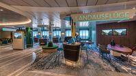 Landausflüge Bereich auf der Mein Schiff 1 – © TUI Cruises