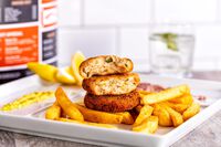 Mein Schiff ® Crab Cake mit Kartoffelspalten – © TUI Cruises