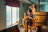 Kinder spielen im Kids Club – © TUI Cruises (2)